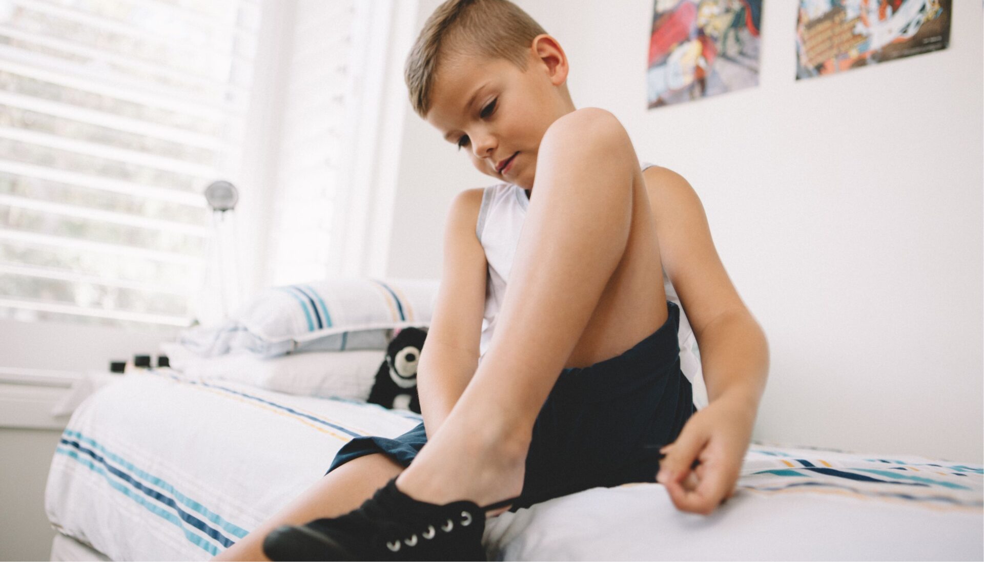 Young boy getting dressed Problems with working memory